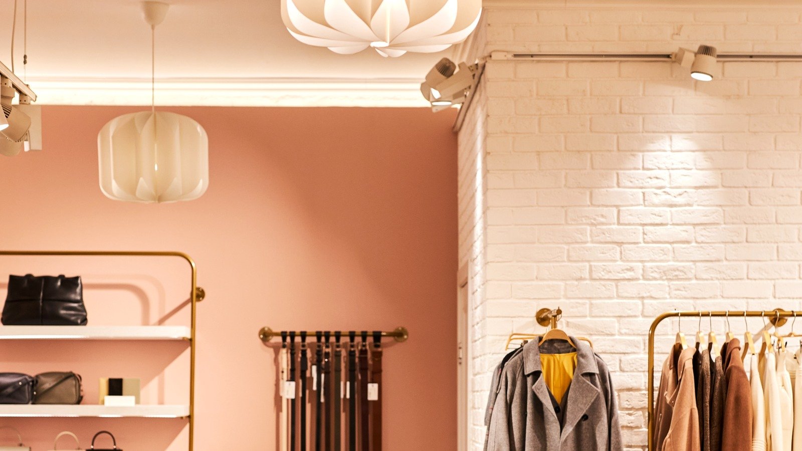 Luxury boutique interior with handbags and apparel